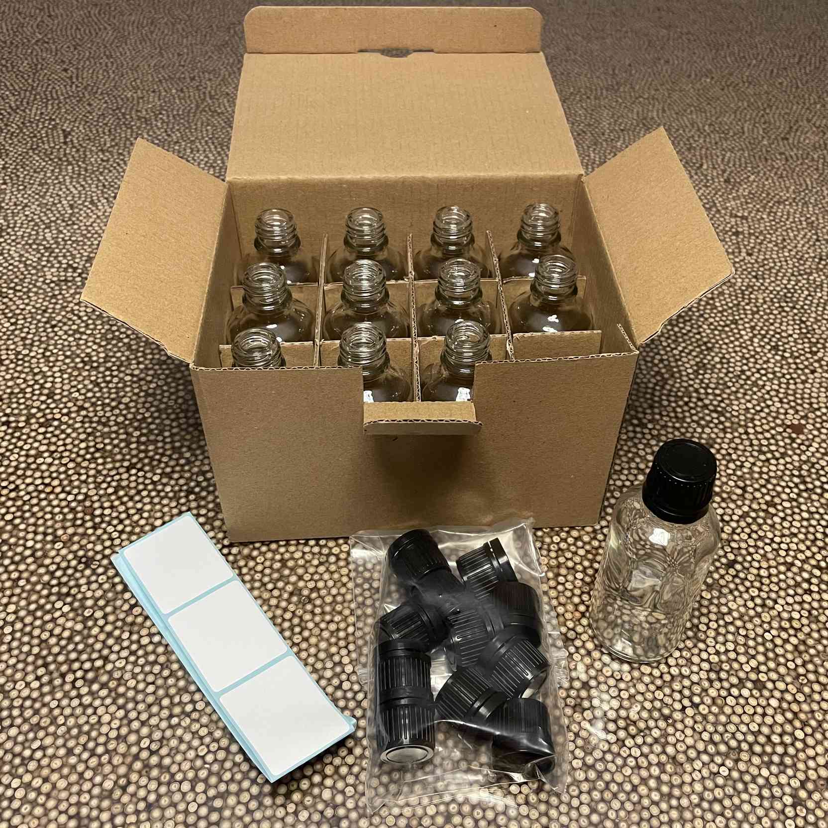 12 flacons verre transparent 5cl et capsule plastique PP18 avec étiquettes